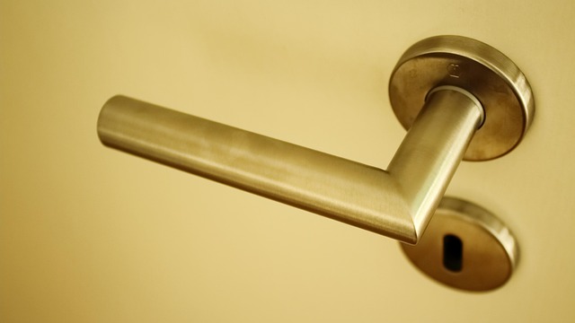 close up photo of door closer adjustment valves sweep and latch